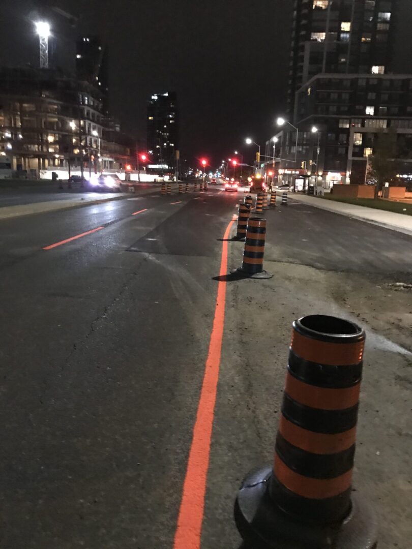 A picture of the orange color line markings on the road